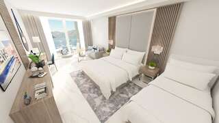 Отель Blue Kotor Bay Premium Spa Resort Котор Улучшенный трехместный номер с видом на море-1